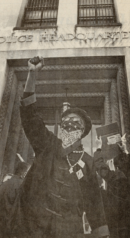 Vincent Terrell marches outside police headquarters, 2002