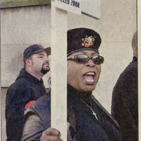 Sarah Bradley-Easter marches outside police headquarters, 2002